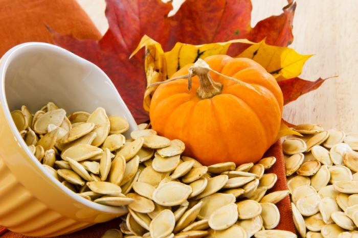 pumpkin-seeds-with-pumpkin-and-leaves