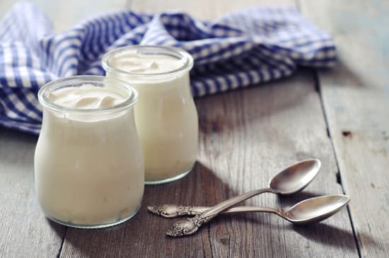 jars-of-yogurt-on-a-wooden-table